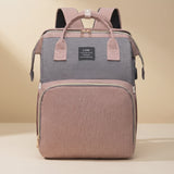 Ayviora Nest Bag Blush - de tas vouwt open tot babybedje