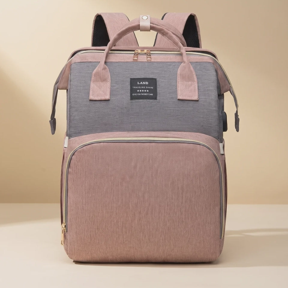 Ayviora Nest Bag Blush - de tas vouwt open tot babybedje